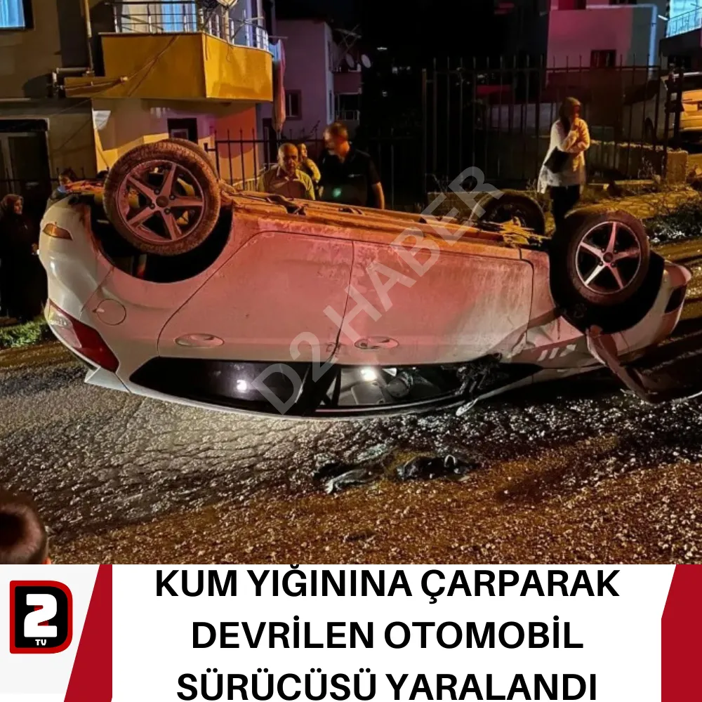 KUM YIĞININA ÇARPARAK DEVRİLEN OTOMOBİL SÜRÜCÜSÜ YARALANDI